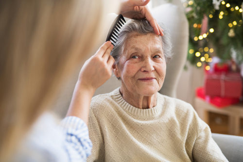 Care Professional helping with personal care